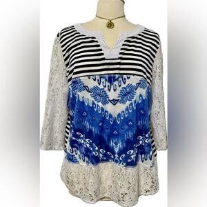 Lace with intricate-detailing City Girl top!